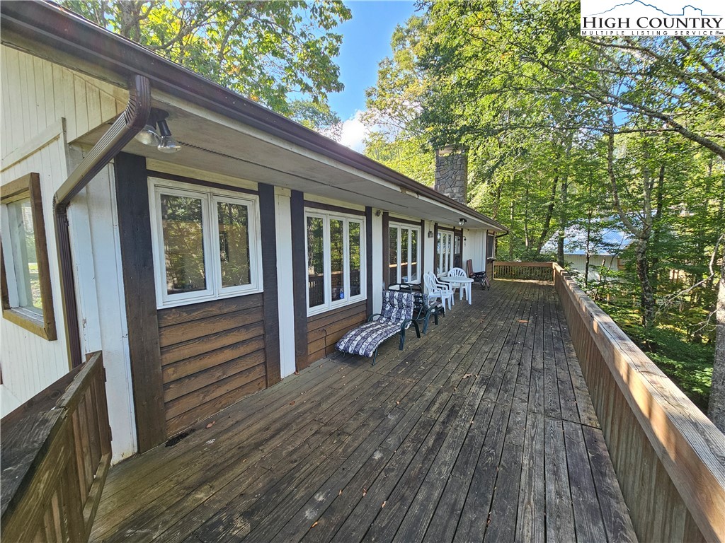 109 Foxgrape Hollow Road Beech Mountain, NC 28604 - Photo 35 of 50 a view of a house with backyard and porch