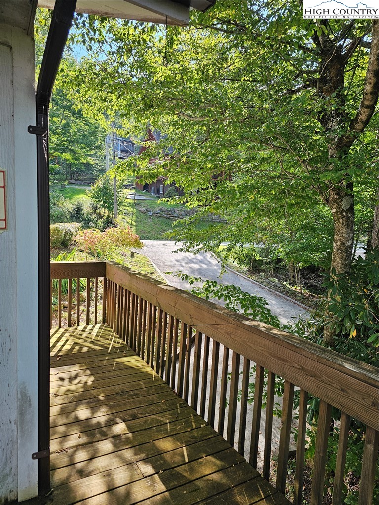 109 Foxgrape Hollow Road Beech Mountain, NC 28604 - Photo 39 of 50 a view of a wooden fence