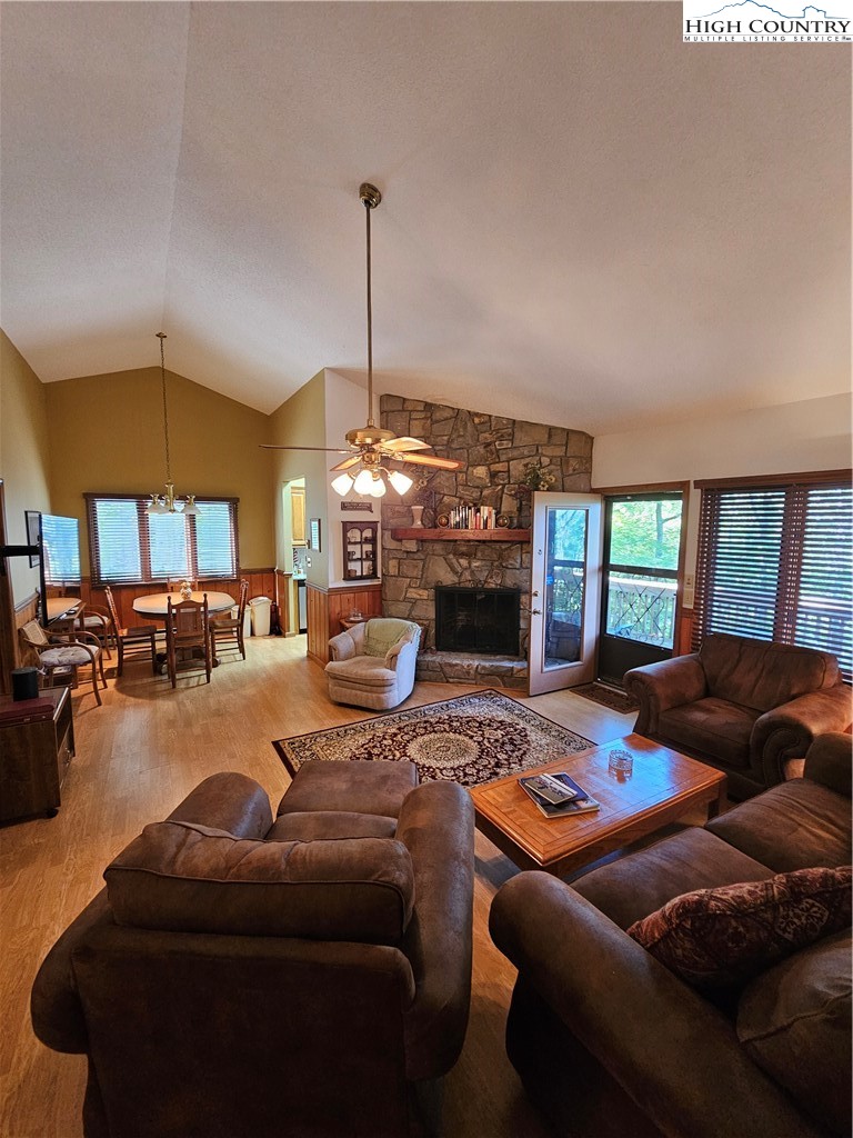 109 Foxgrape Hollow Road Beech Mountain, NC 28604 - Photo 4 of 50 a outdoor space with furniture and chandelier