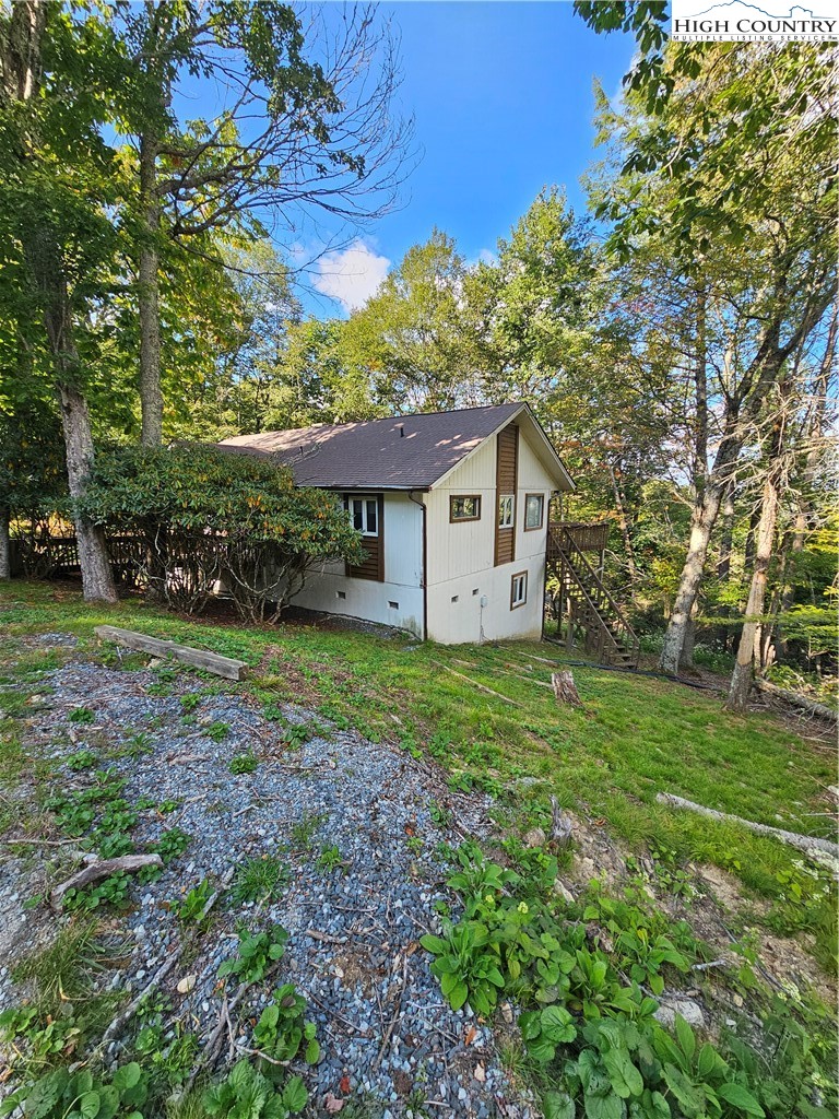 109 Foxgrape Hollow Road Beech Mountain, NC 28604 - Photo 47 of 50 a view of a house with backyard