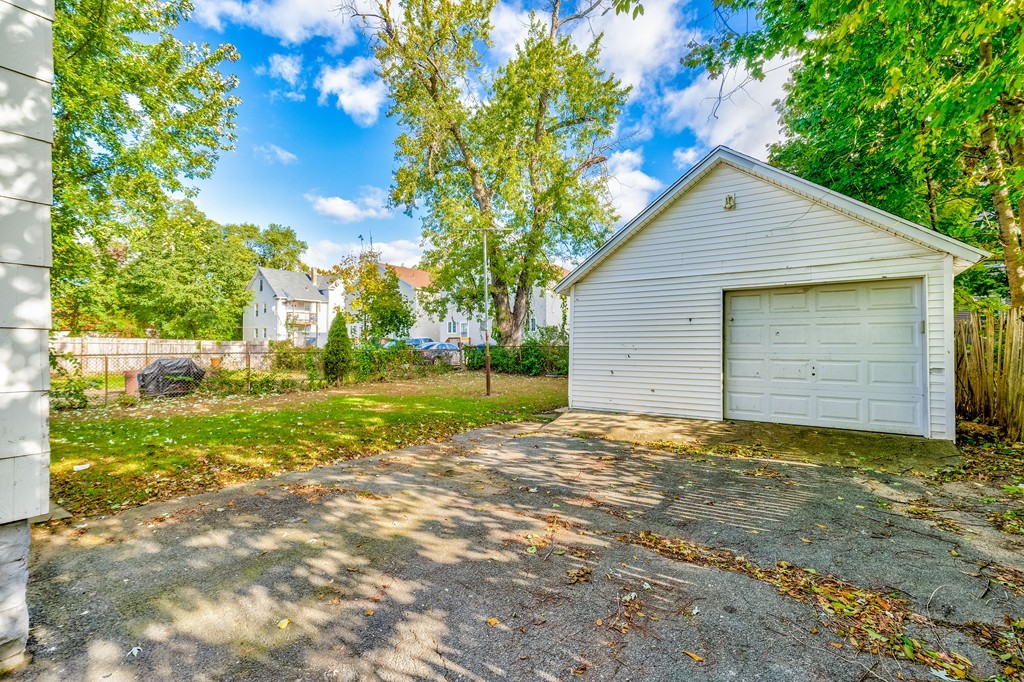 247-249 Commonwealth Avenue Springfield, MA 01108 - Photo 3 of 26 a view of a house with backyard and garden