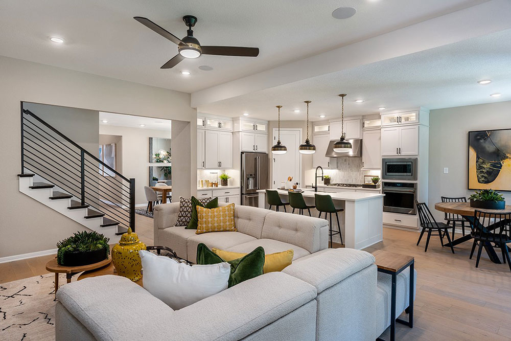 1212 Scenic Grn Loop Georgetown, TX 78628 - Photo 22 of 36 a living room with furniture kitchen view and a chandelier