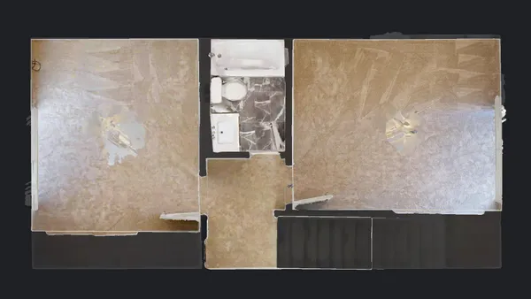 a black and white photo of a bathroom