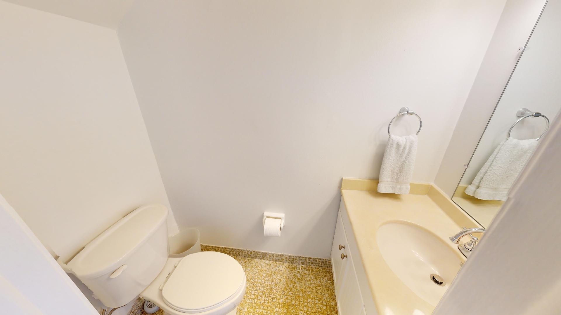 300 Ocean Drive, Unit 22 Key Largo, FL 33037 - Photo 10 of 20 a bathroom with a sink and a toilet