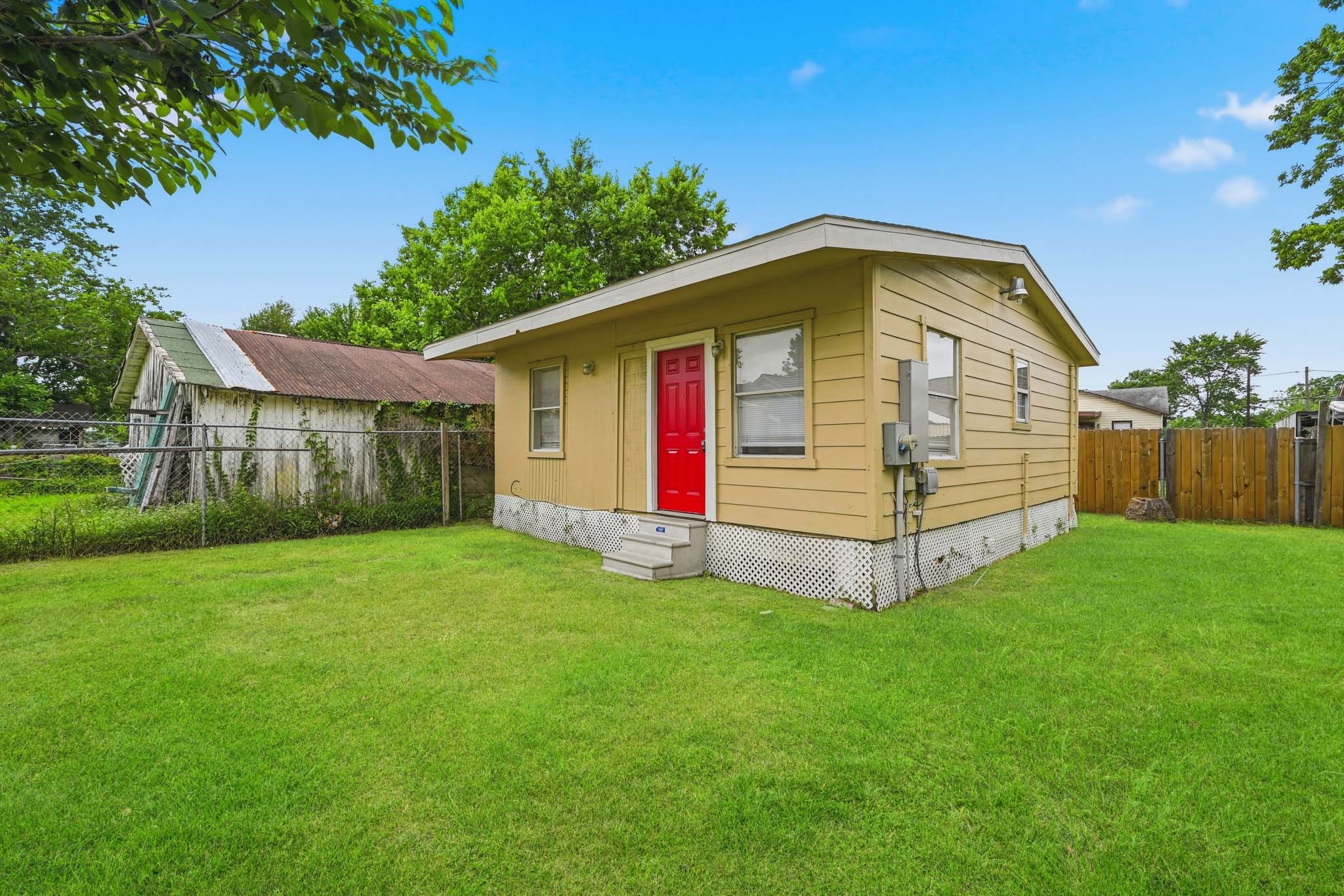 10001 Lucore Street, Unit BACK Houston, TX 77017 - Photo 1 of 17 a view of a house with a yard