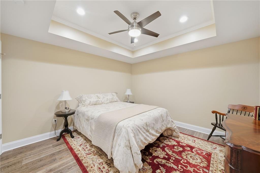 619 Blackwater Ridge Canton, GA 30114 - Photo 22 of 41 a bedroom with a bed and a rug