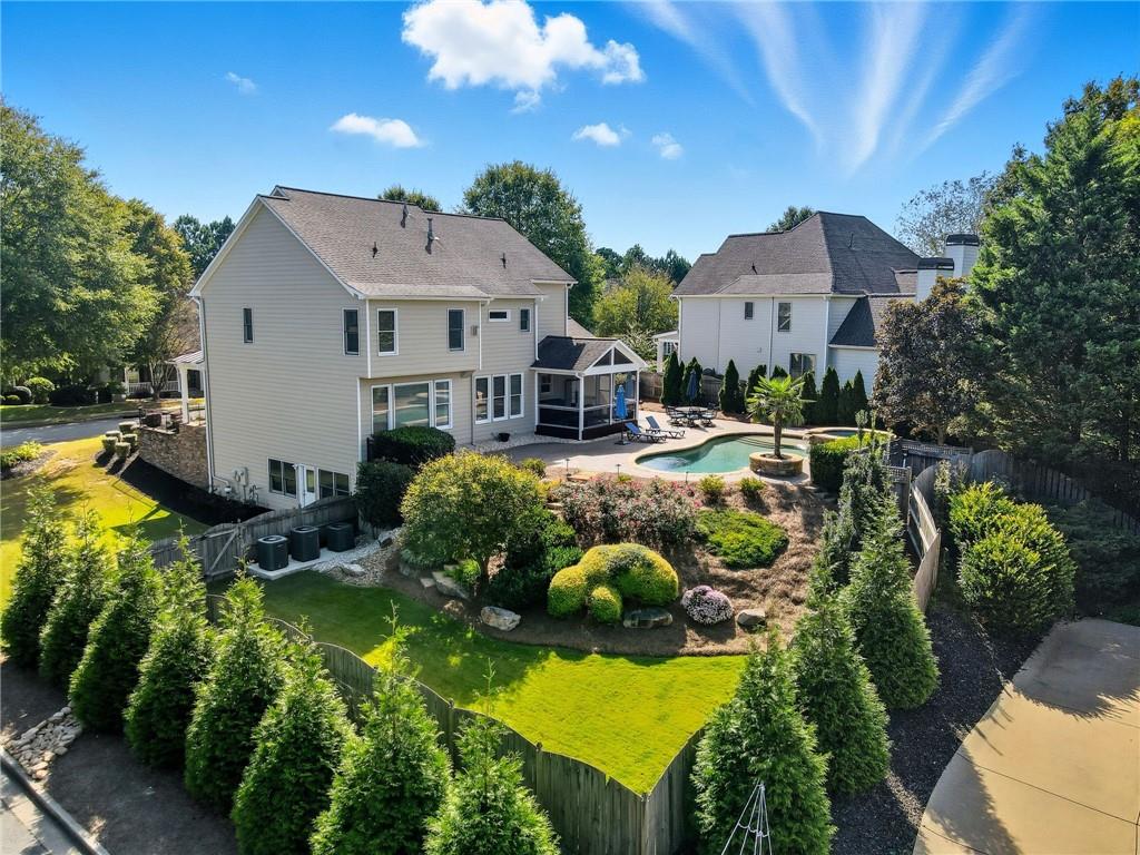 619 Blackwater Ridge Canton, GA 30114 - Photo 26 of 41 an aerial view of a house with swimming pool a yard and a patio