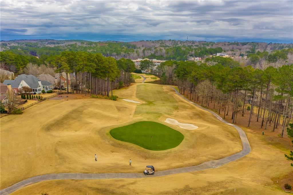 619 Blackwater Ridge Canton, GA 30114 - Photo 39 of 41 a view of a swimming pool with an outdoor seating