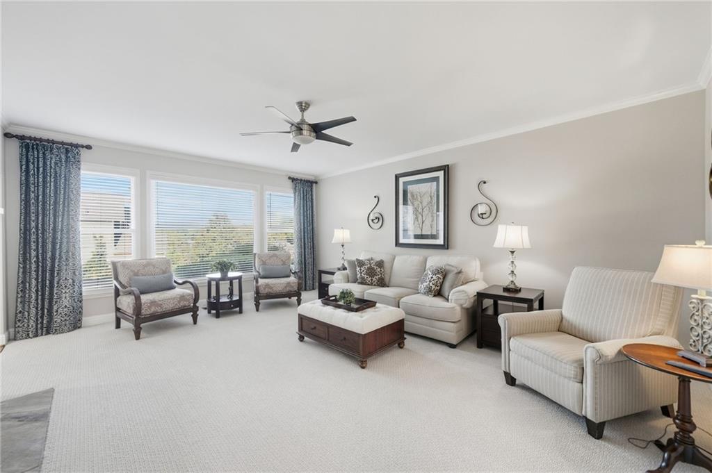 619 Blackwater Ridge Canton, GA 30114 - Photo 8 of 41 a living room with furniture and a large window