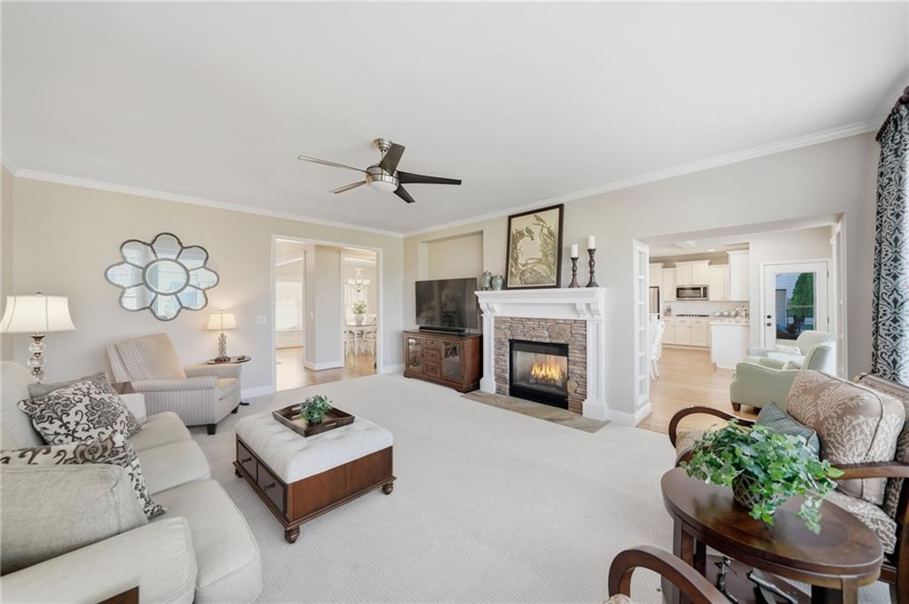 619 Blackwater Ridge Canton, GA 30114 - Photo 9 of 41 a living room with furniture fireplace and window