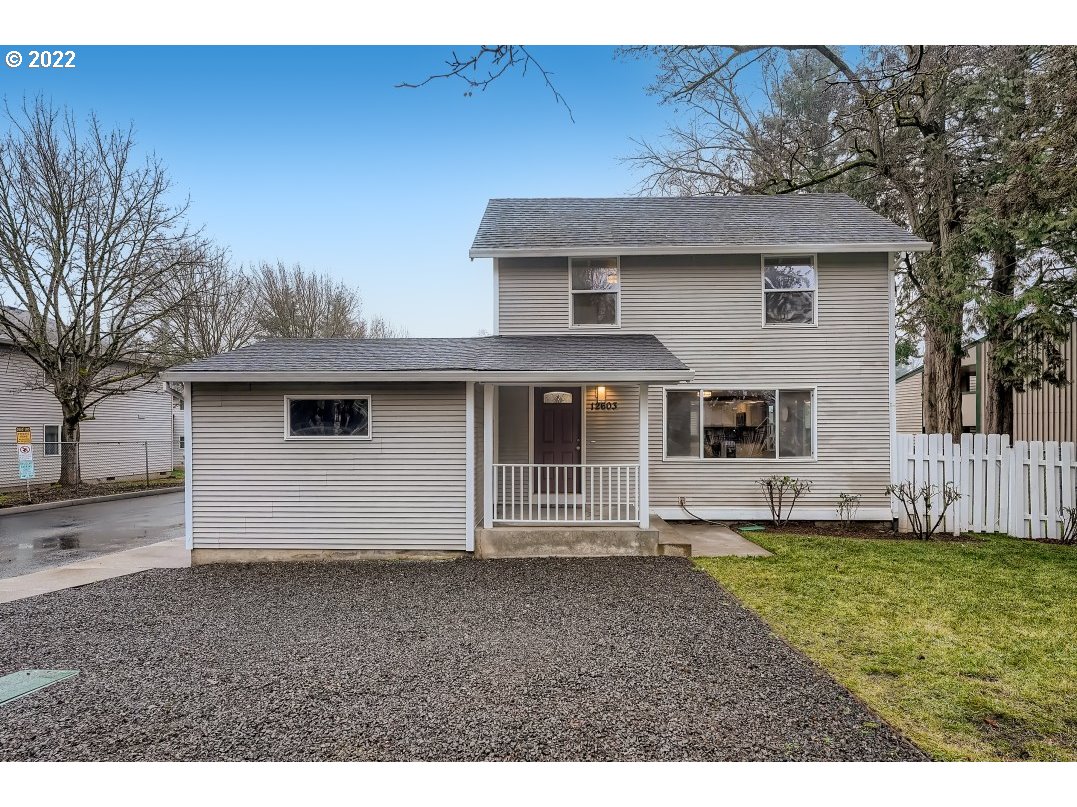 12603 Southeast Foster Road Portland, OR 97236 - Photo 1 of 28 a view of a house with a yard