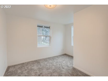 12603 Southeast Foster Road Portland, OR 97236 - Photo 19 of 28 a view of an empty room with a window