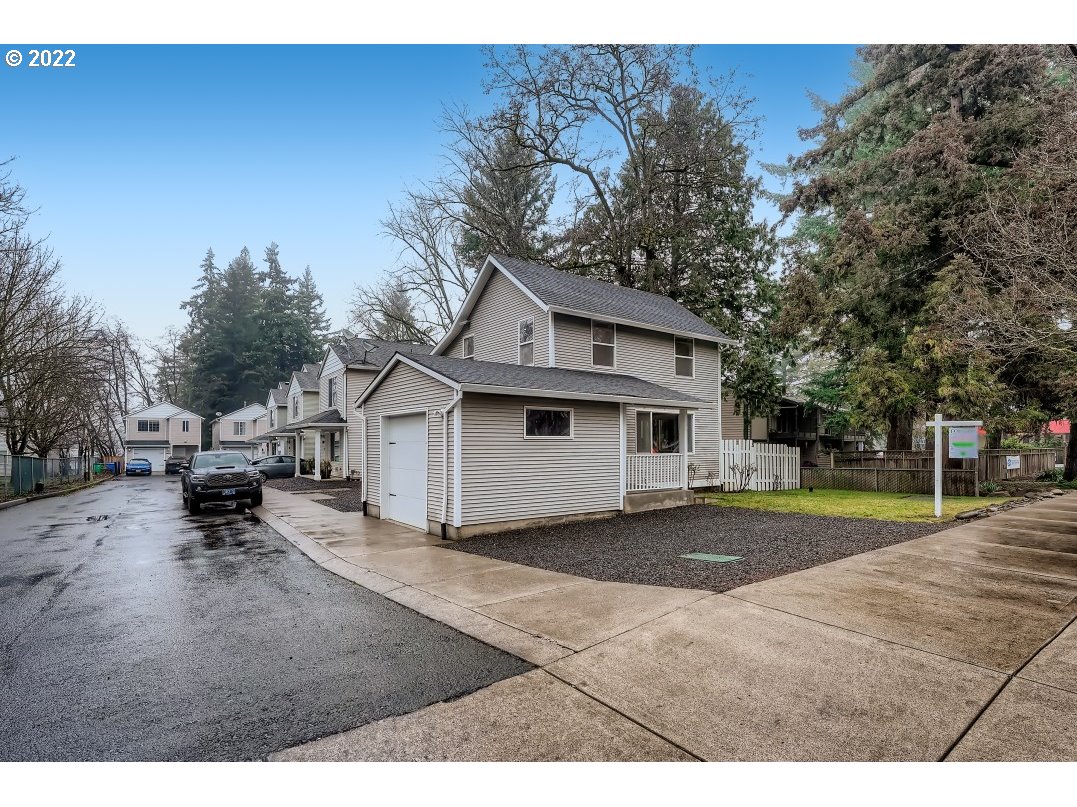 12603 Southeast Foster Road Portland, OR 97236 - Photo 2 of 28 a view of a house with a outdoor space