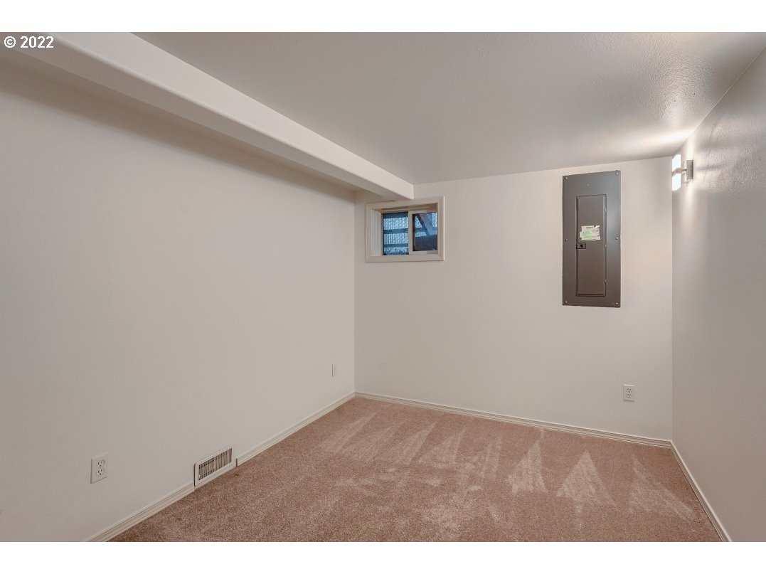 12603 Southeast Foster Road Portland, OR 97236 - Photo 23 of 28 a view of an empty room