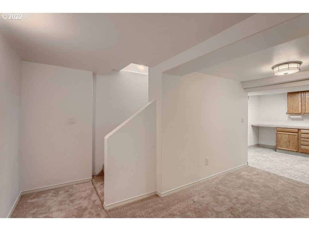 12603 Southeast Foster Road Portland, OR 97236 - Photo 24 of 28 a view of a room with a hallway