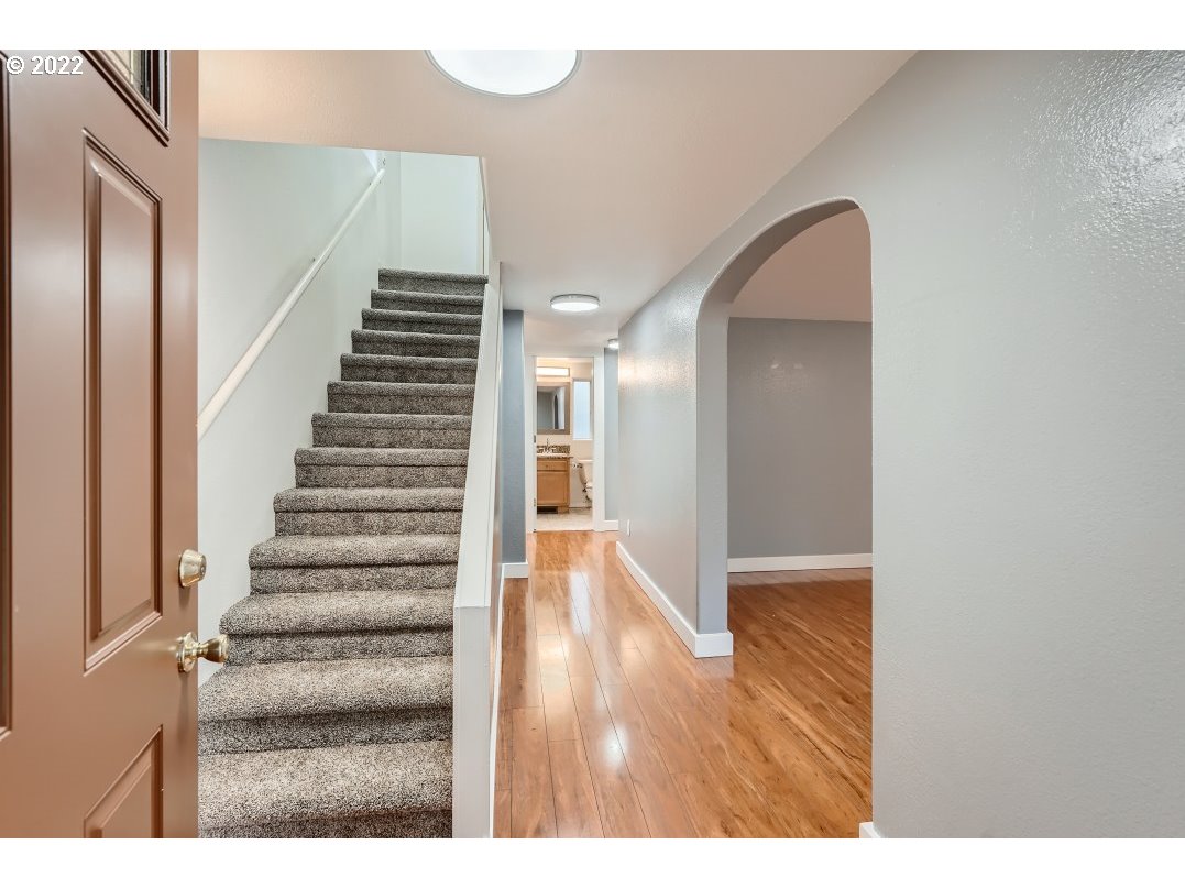 12603 Southeast Foster Road Portland, OR 97236 - Photo 7 of 28 a view of an entryway with wooden floor