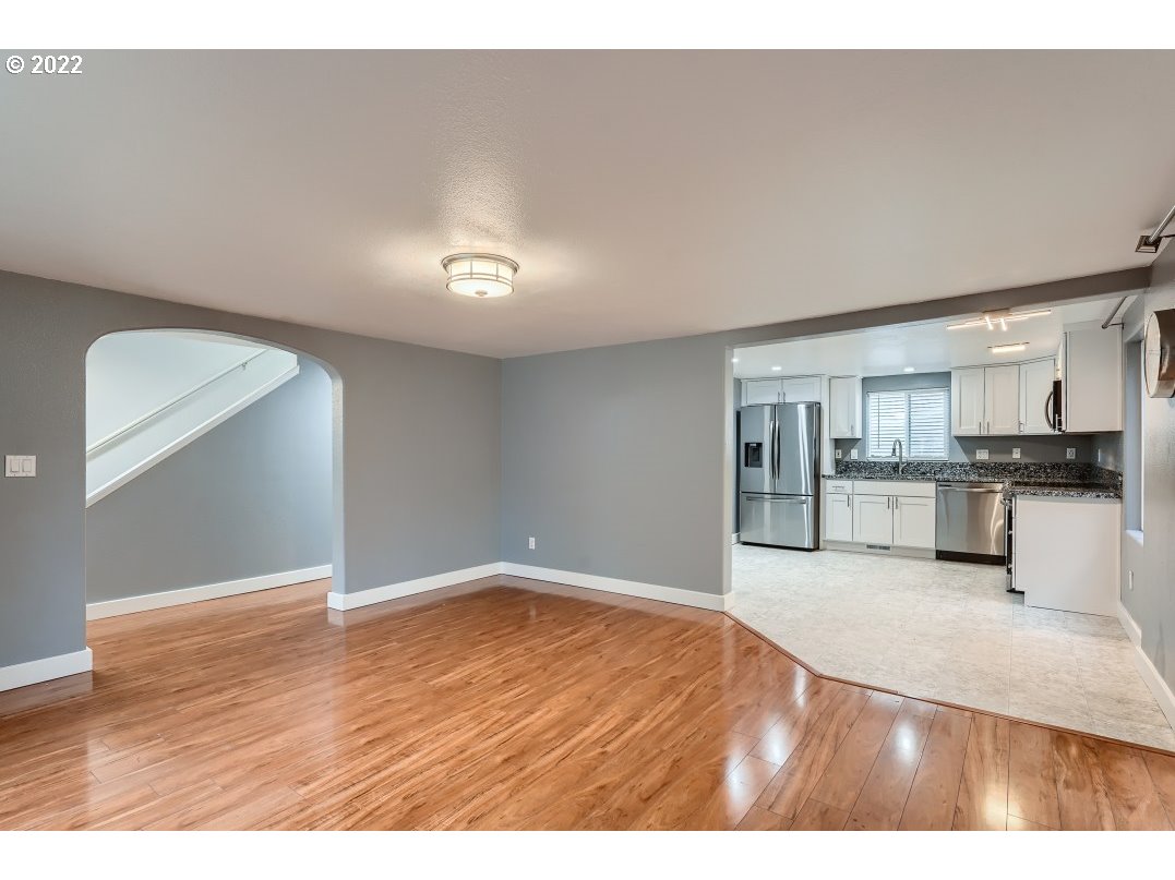 12603 Southeast Foster Road Portland, OR 97236 - Photo 10 of 28 a view of kitchen with wooden floor