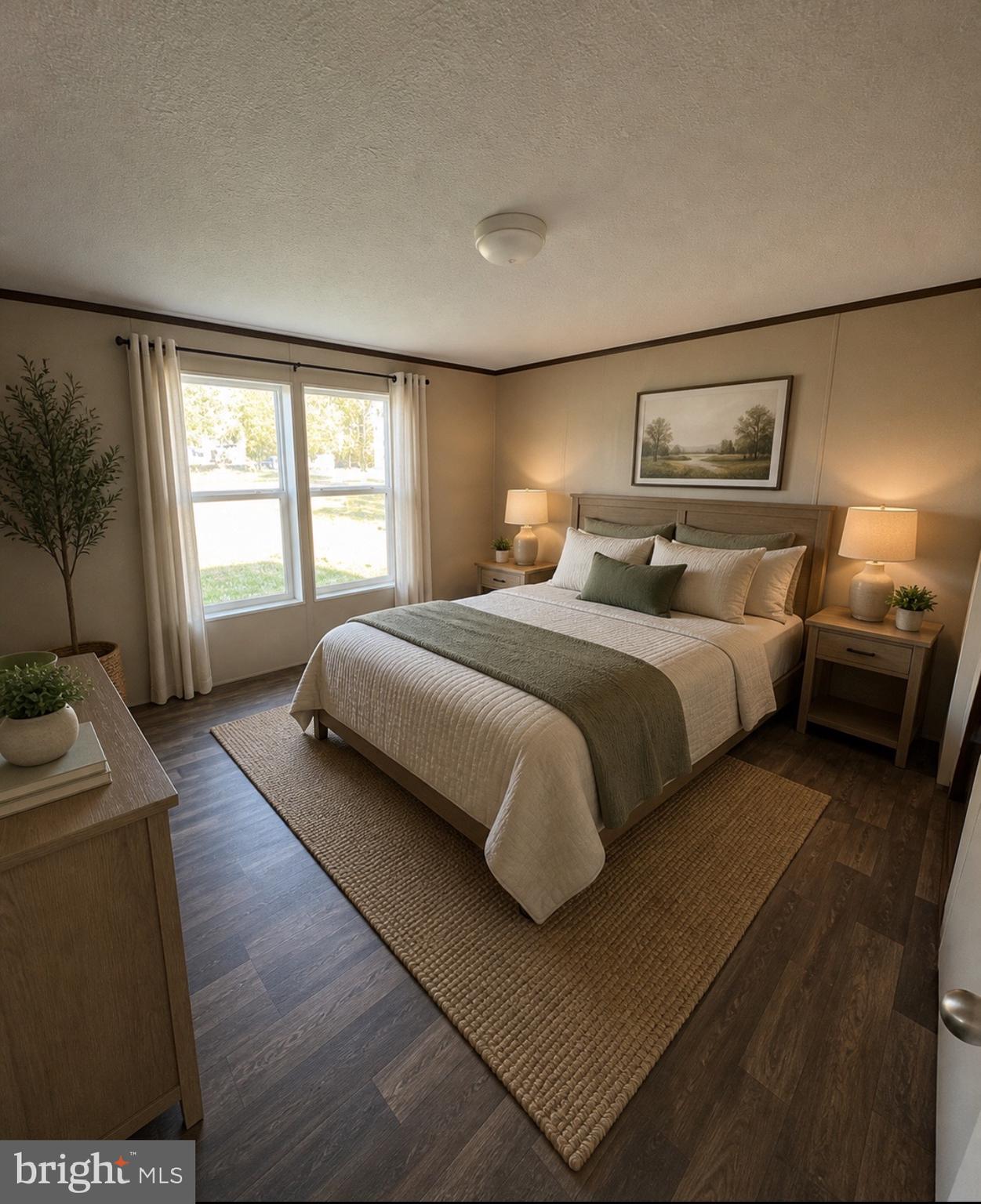 1555 Tavern Run Road Hague, VA 22469 - Photo 5 of 9 a bedroom with a bed and wooden floor