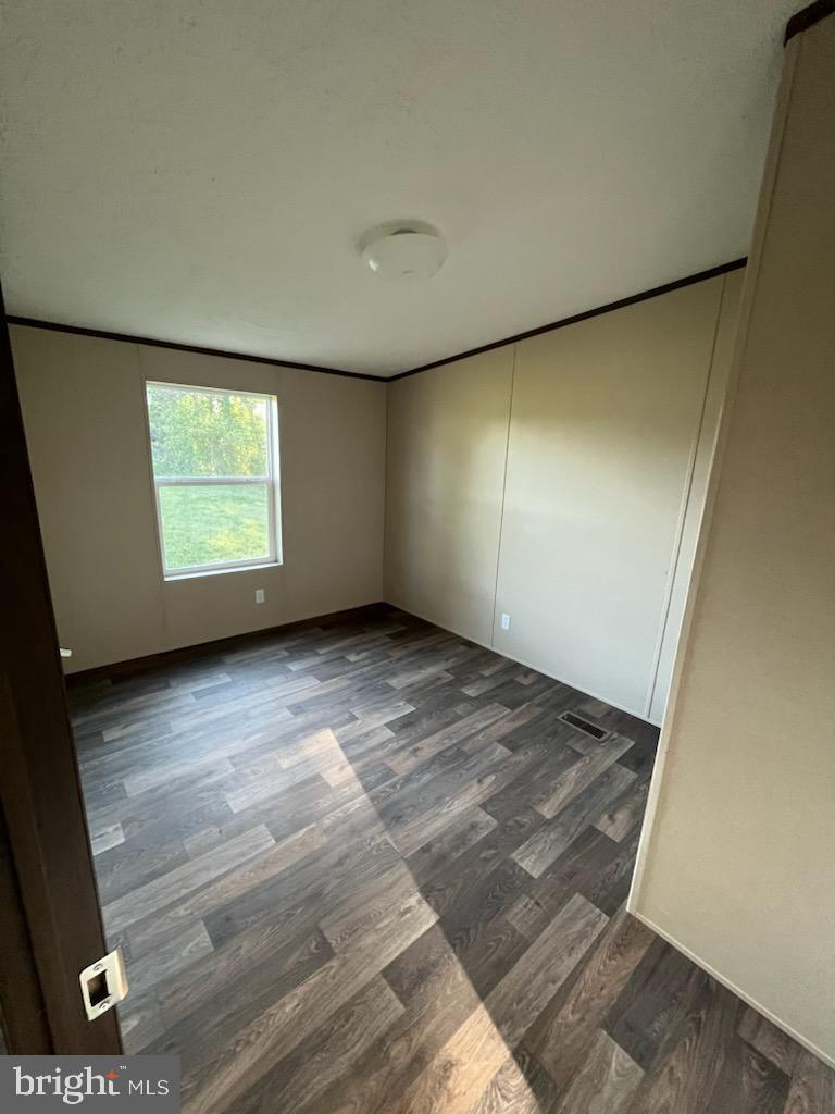 1555 Tavern Run Road Hague, VA 22469 - Photo 8 of 9 an empty room with windows