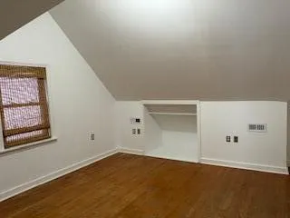 an empty room with a workbench