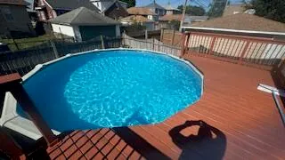 a view of an chairs and table in patio