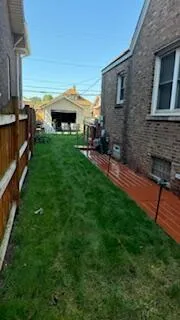 a patio with table and chairs