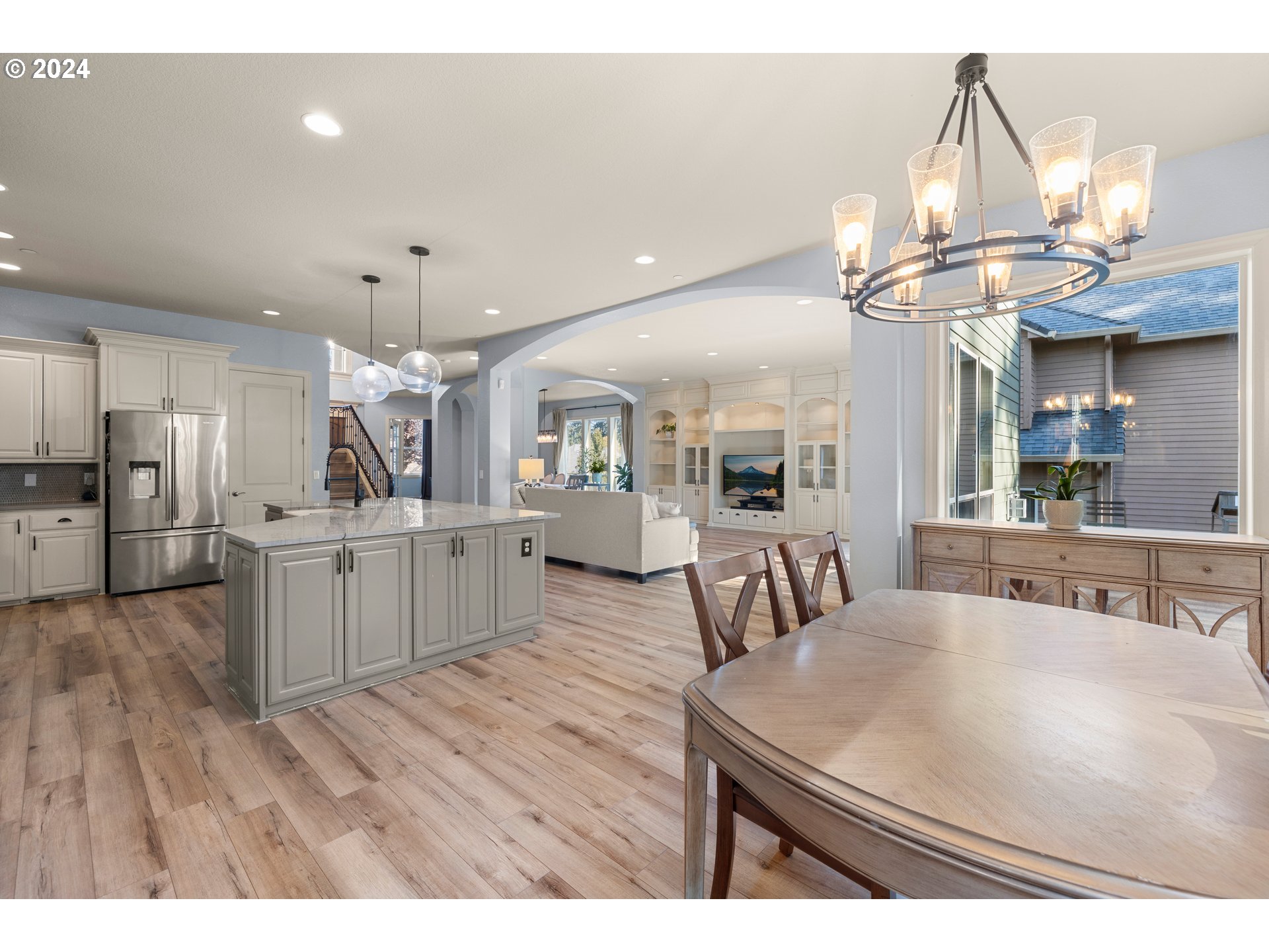 606 Northwest 24th Circle Camas, WA 98607 - Photo 12 of 48 a kitchen with stainless steel appliances kitchen island a large island in the center