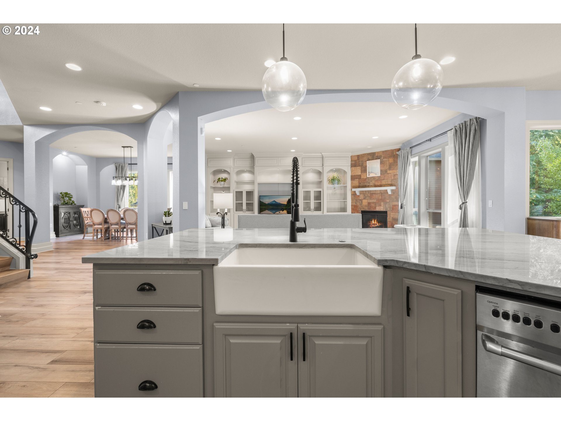 606 Northwest 24th Circle Camas, WA 98607 - Photo 17 of 48 a kitchen with a sink and chandelier