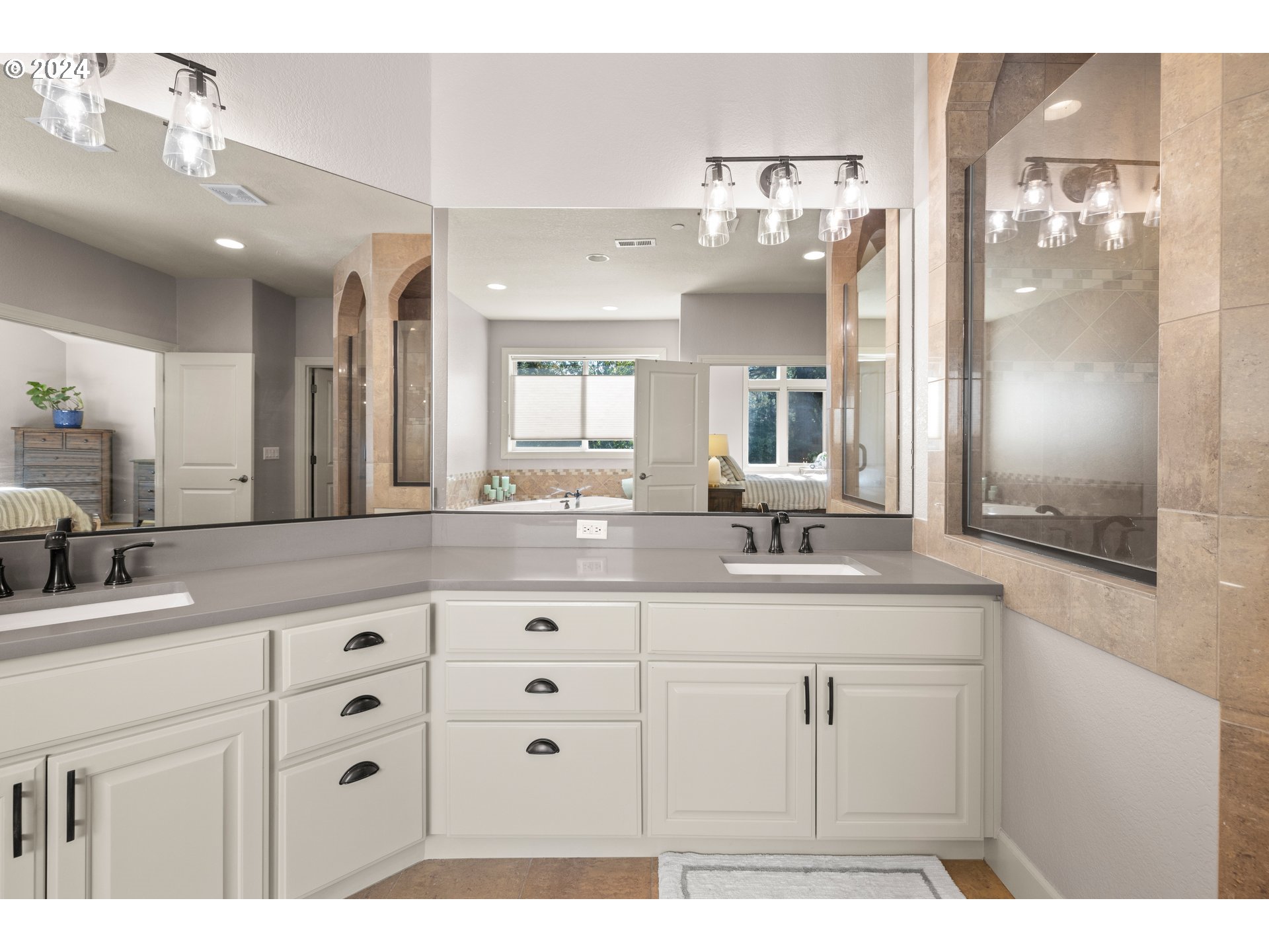 606 Northwest 24th Circle Camas, WA 98607 - Photo 30 of 48 a bathroom with a sink vanity granite and a mirror
