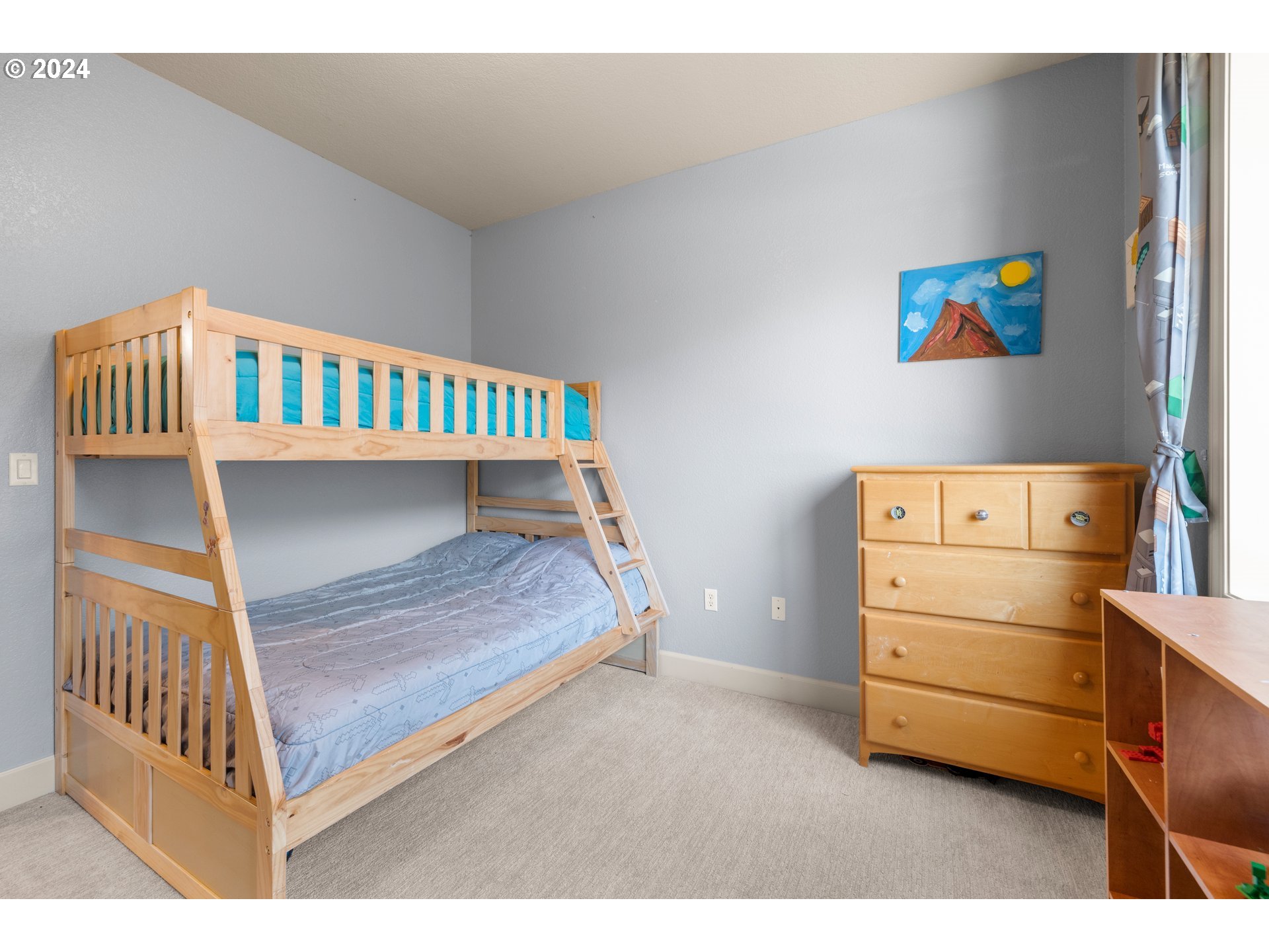 606 Northwest 24th Circle Camas, WA 98607 - Photo 34 of 48 a bedroom with a bunk bed and a dresser