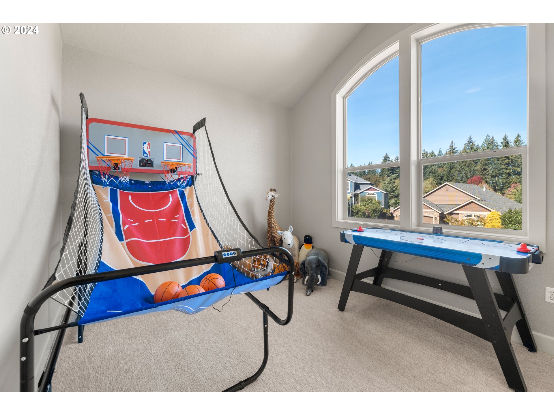 606 Northwest 24th Circle Camas, WA 98607 - Photo 36 of 48 a room with furniture and air hockey table