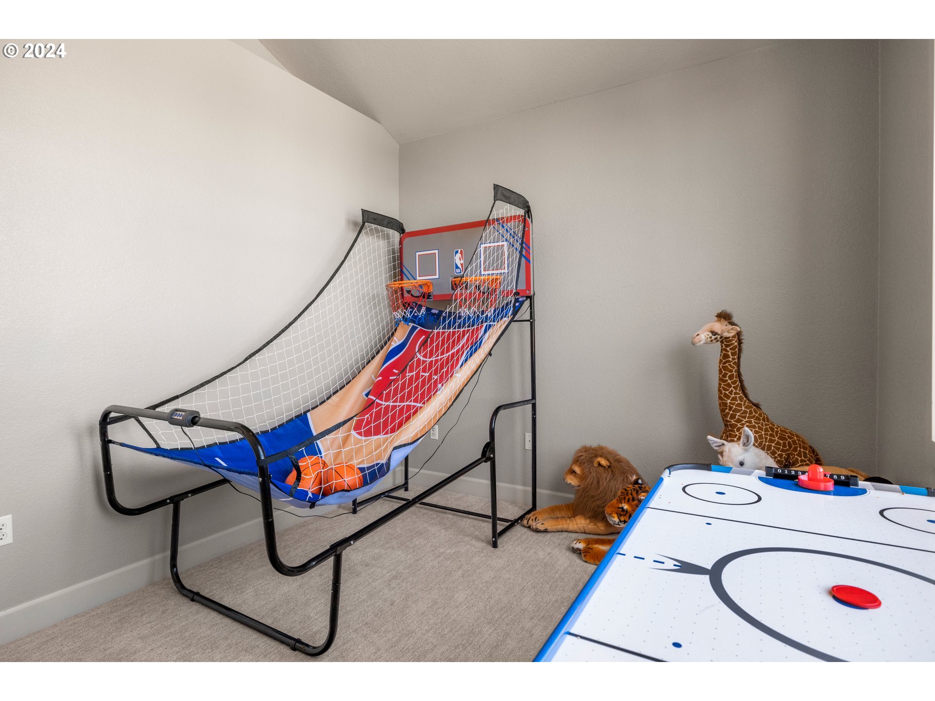 606 Northwest 24th Circle Camas, WA 98607 - Photo 37 of 48 a room with furniture and air hockey table