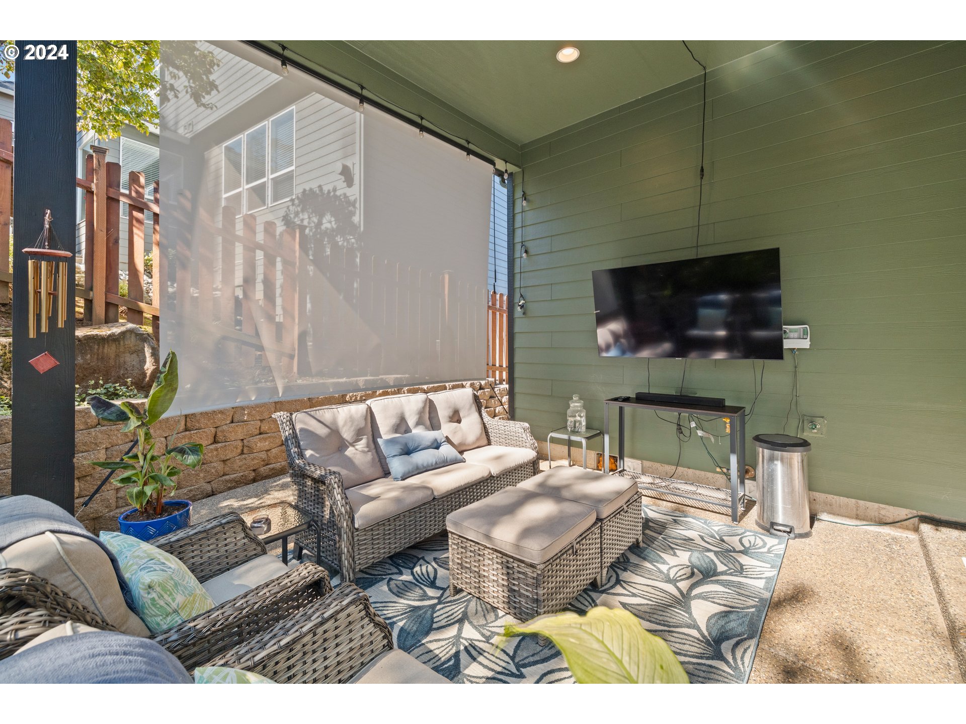 606 Northwest 24th Circle Camas, WA 98607 - Photo 38 of 48 a living room with furniture and a flat screen tv