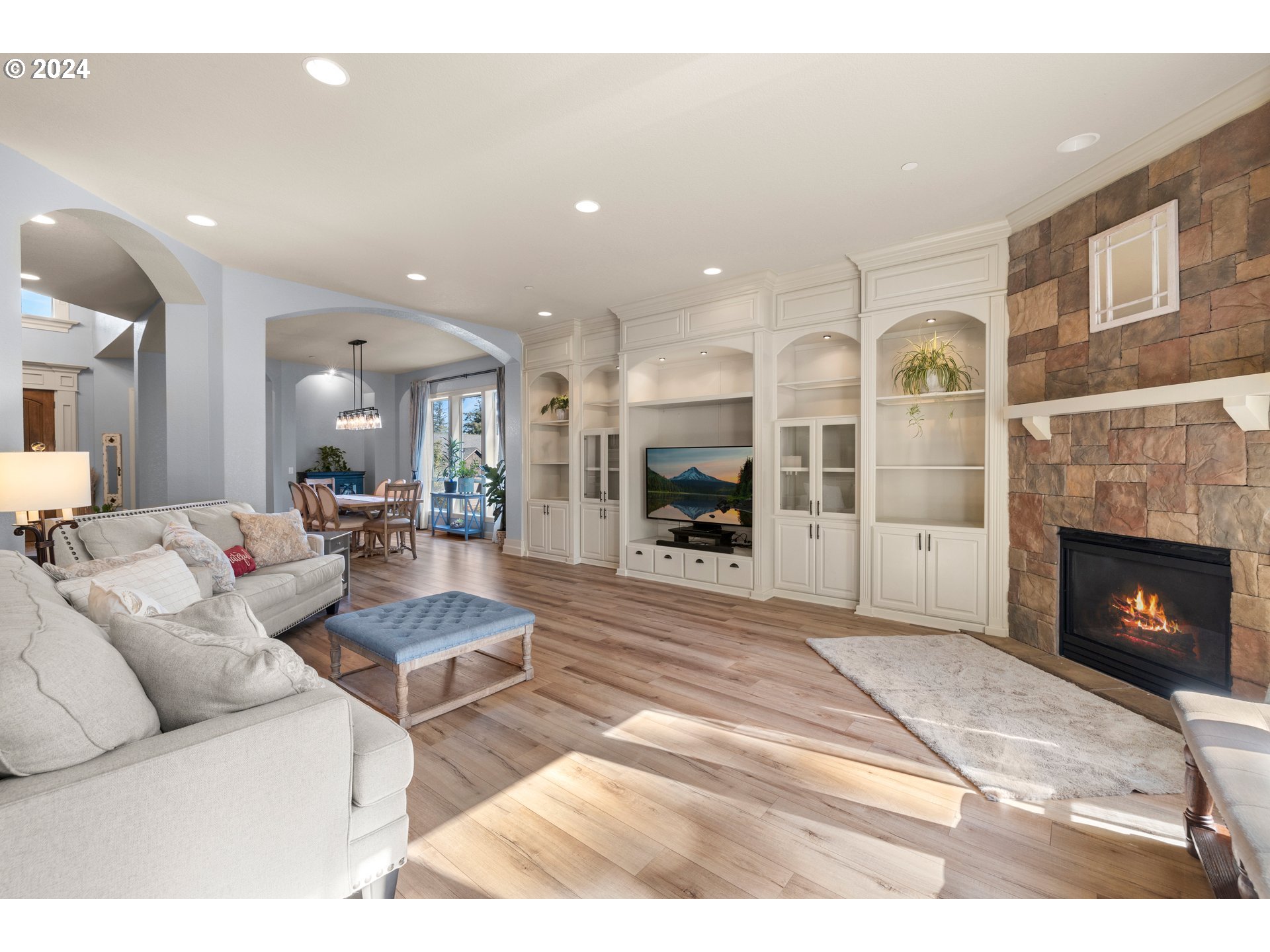 606 Northwest 24th Circle Camas, WA 98607 - Photo 8 of 48 a living room with furniture and a fireplace