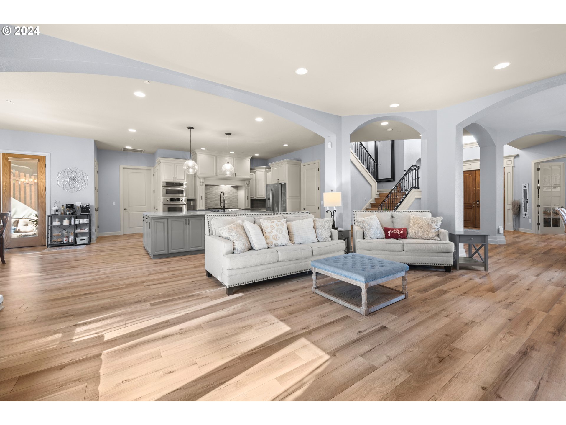 606 Northwest 24th Circle Camas, WA 98607 - Photo 9 of 48 a living room with furniture and a wooden floor