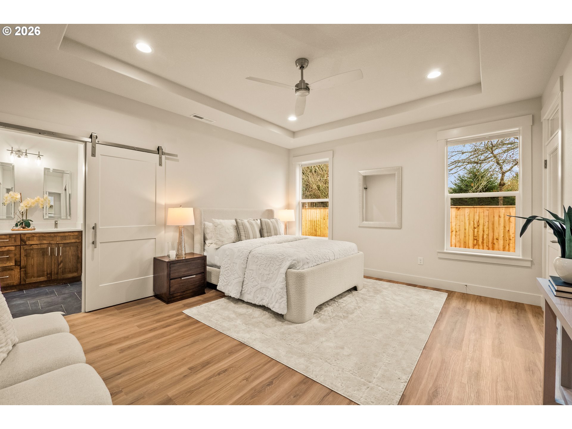 315 Northeast Clay Street Sublimity, OR 97385 - Photo 21 of 42 a bedroom with a large bed and wooden floor