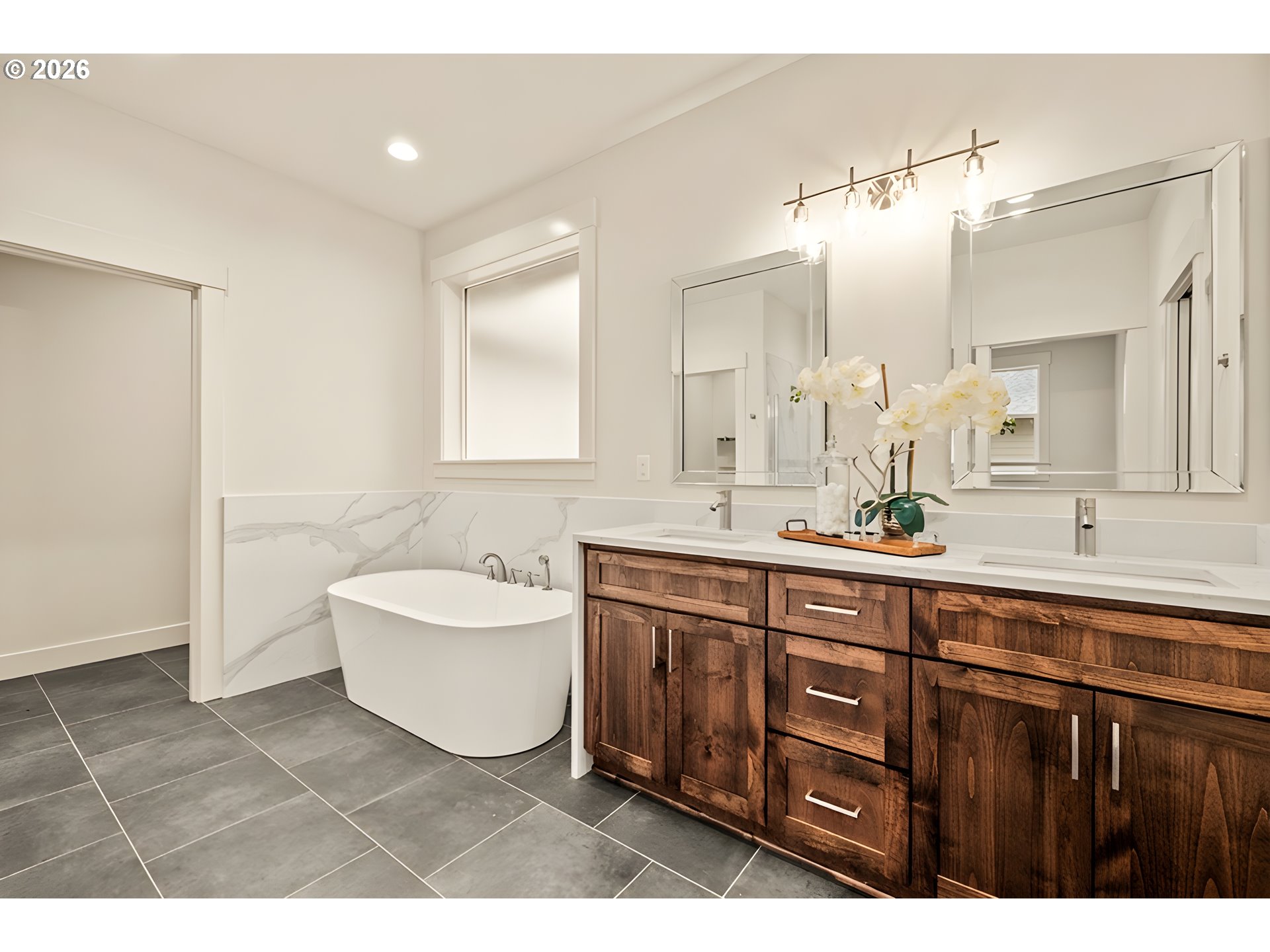 315 Northeast Clay Street Sublimity, OR 97385 - Photo 24 of 42 a spacious bathroom with a double vanity sink mirror and bathtub