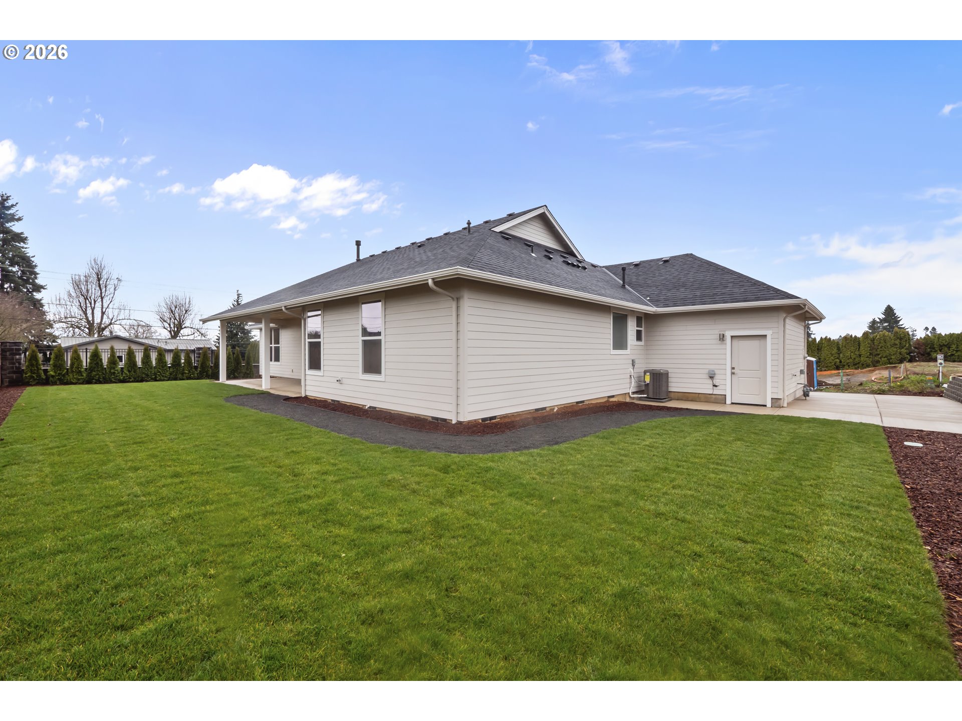 315 Northeast Clay Street Sublimity, OR 97385 - Photo 40 of 42 a front view of a house with garden