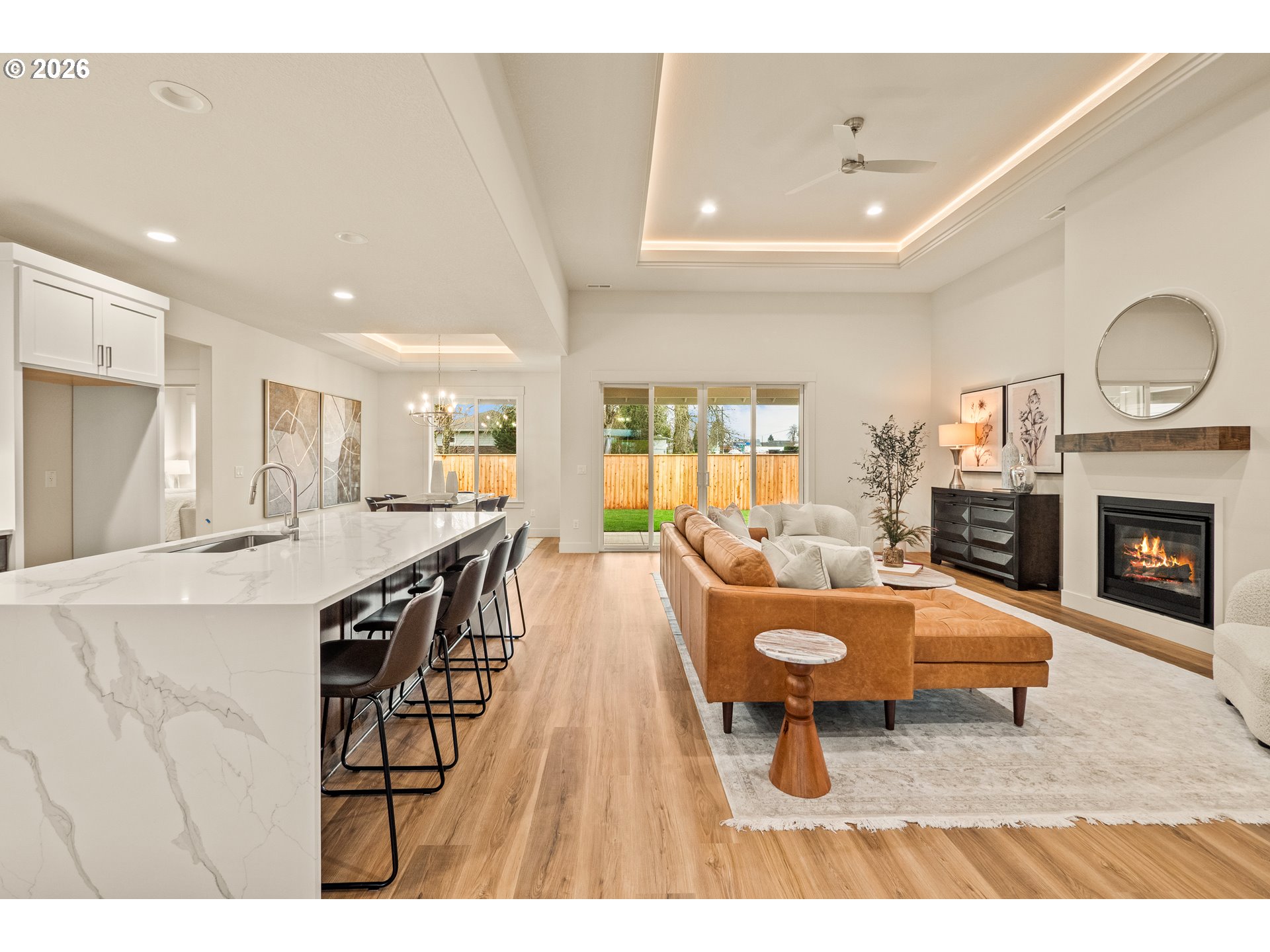 315 Northeast Clay Street Sublimity, OR 97385 - Photo 10 of 42 a living room with furniture a fireplace and a flat screen tv