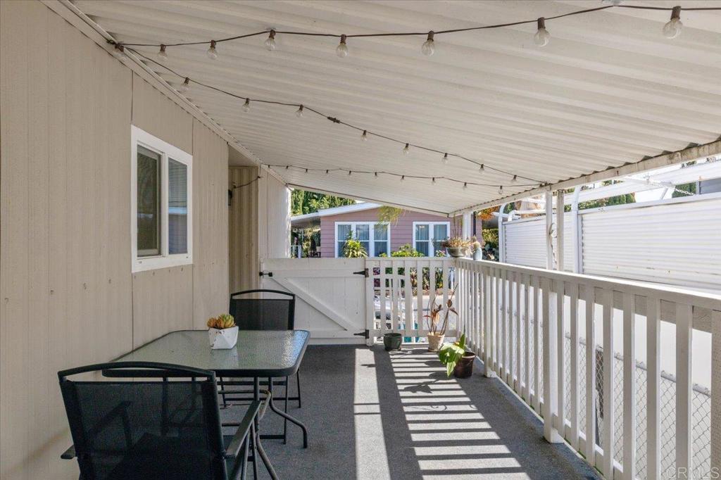 4660 North River Road, Unit 150 Oceanside, CA 92057 - Photo 17 of 23 a view of a balcony with chairs