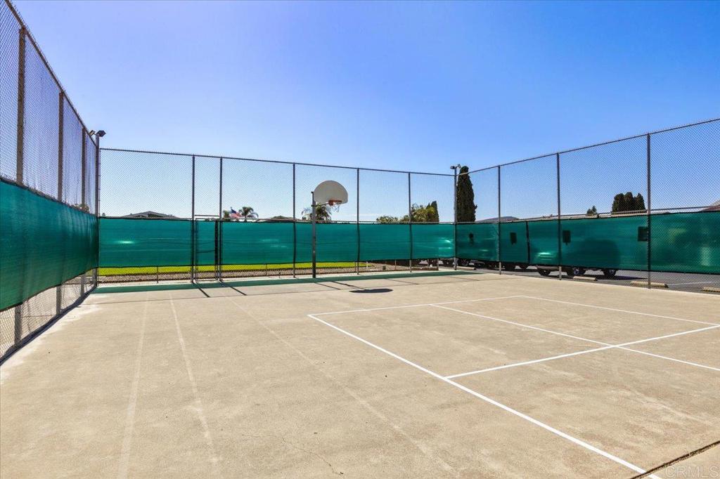 4660 North River Road, Unit 150 Oceanside, CA 92057 - Photo 22 of 23 a view of a tennis court