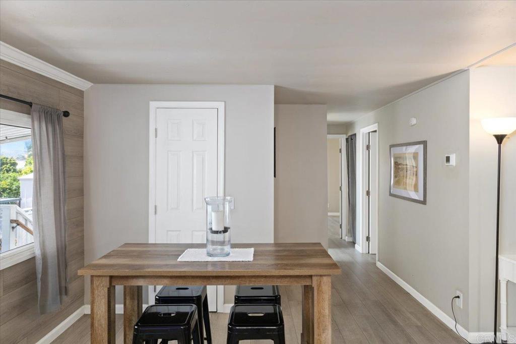 4660 North River Road, Unit 150 Oceanside, CA 92057 - Photo 8 of 23 a view of a room with a table and chairs