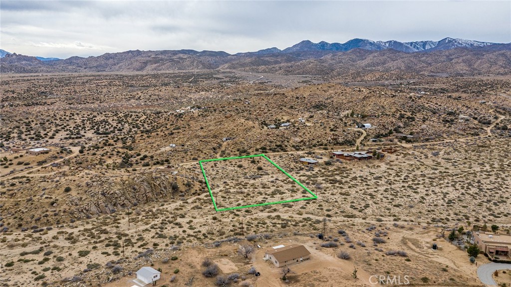 52500 Riverside Drive Pioneertown, CA 92268 - Photo 18 of 23 a view of a lush green field