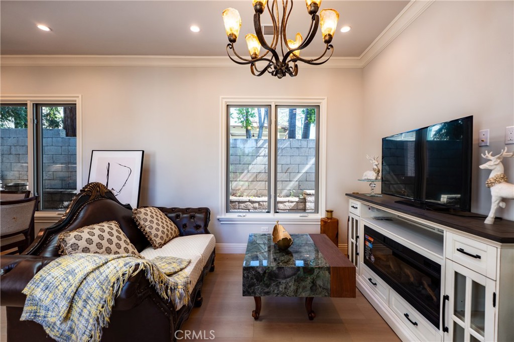 894 Fallen Leaf Road Arcadia, CA 91006 - Photo 3 of 28 a living room with furniture and a flat screen tv