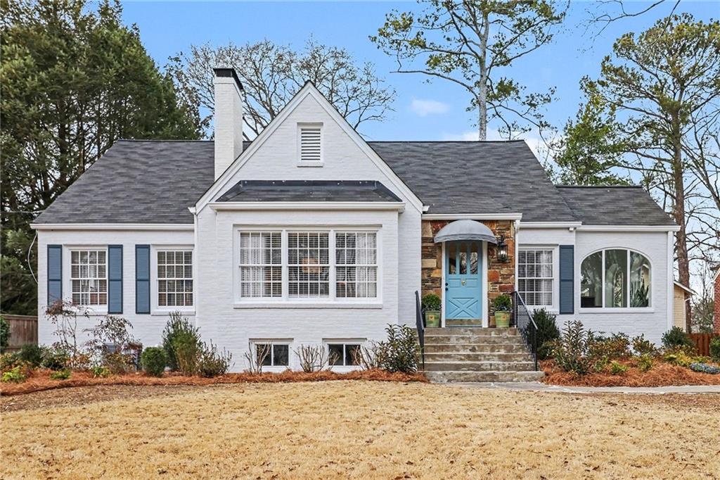 front view of a house with a yard