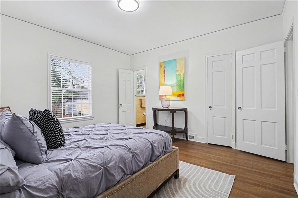 1746 Johnson Road Northeast Atlanta, GA 30306 - Photo 20 of 45 a bedroom with a bed and a window