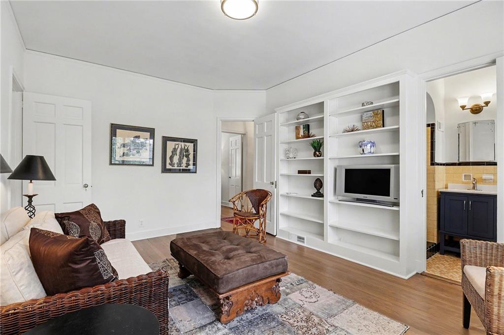 1746 Johnson Road Northeast Atlanta, GA 30306 - Photo 26 of 45 a living room with furniture and a fireplace
