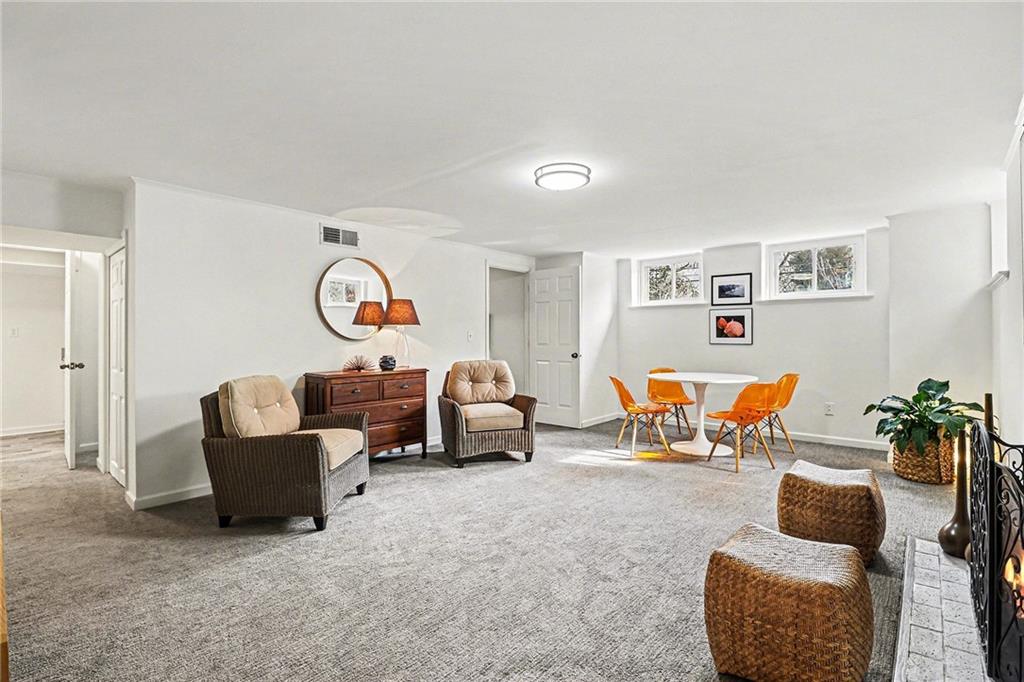 1746 Johnson Road Northeast Atlanta, GA 30306 - Photo 33 of 45 a living room with furniture and a couch