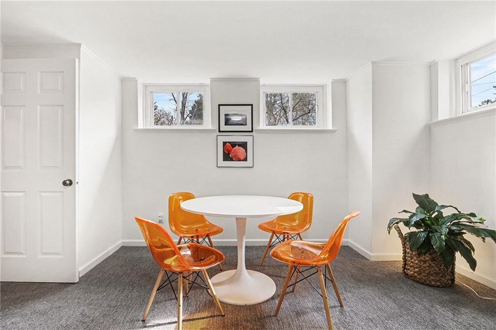 1746 Johnson Road Northeast Atlanta, GA 30306 - Photo 36 of 45 a dining room with furniture and potted plants