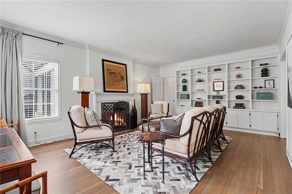 1746 Johnson Road Northeast Atlanta, GA 30306 - Photo 9 of 45 a living room with furniture and a fireplace